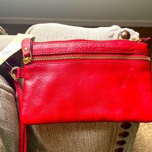Red Wilson’s leather wristlet
